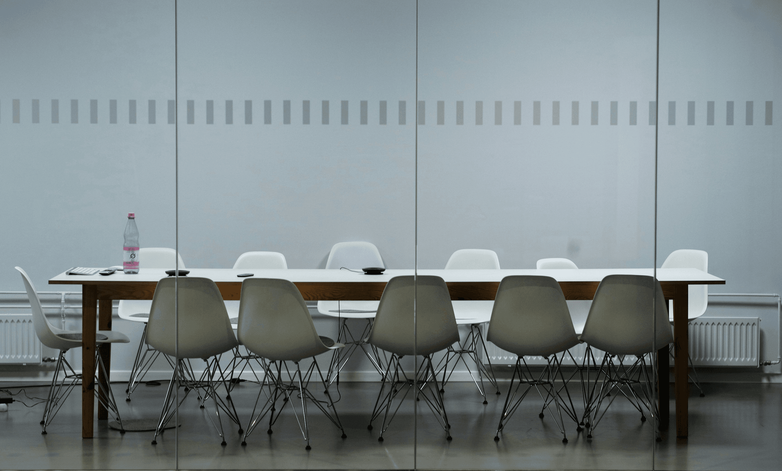 Diverse team members discussing ideas and opportunities in the modern office – GCG Inc.