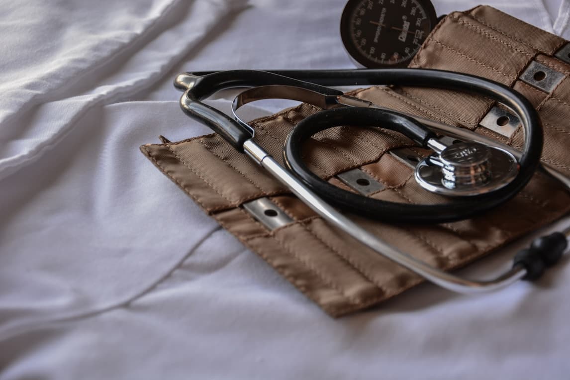 A stethoscope resting on a table, symbolizing the vital role of medical tools in accurate patient diagnosis and care.